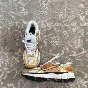 Nike Women's Gold and White Sneakers
